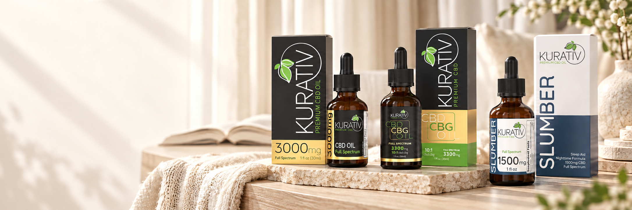 Kurativ Premium CBD full-spectrum CBD oil, CBD CBG oil and Slumber oil with their boxes on a sunlit reading-room console