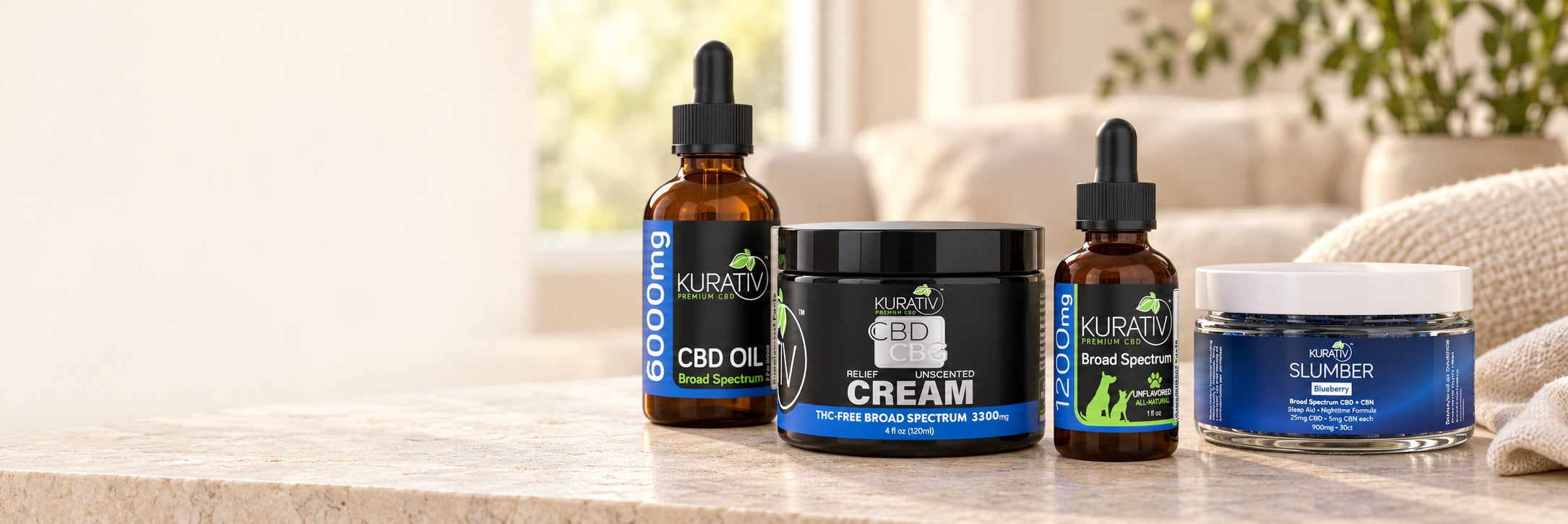 Broad-spectrum CBD oil, CBD CBG cream, Slumber gummies and pet oil on a sunlit console