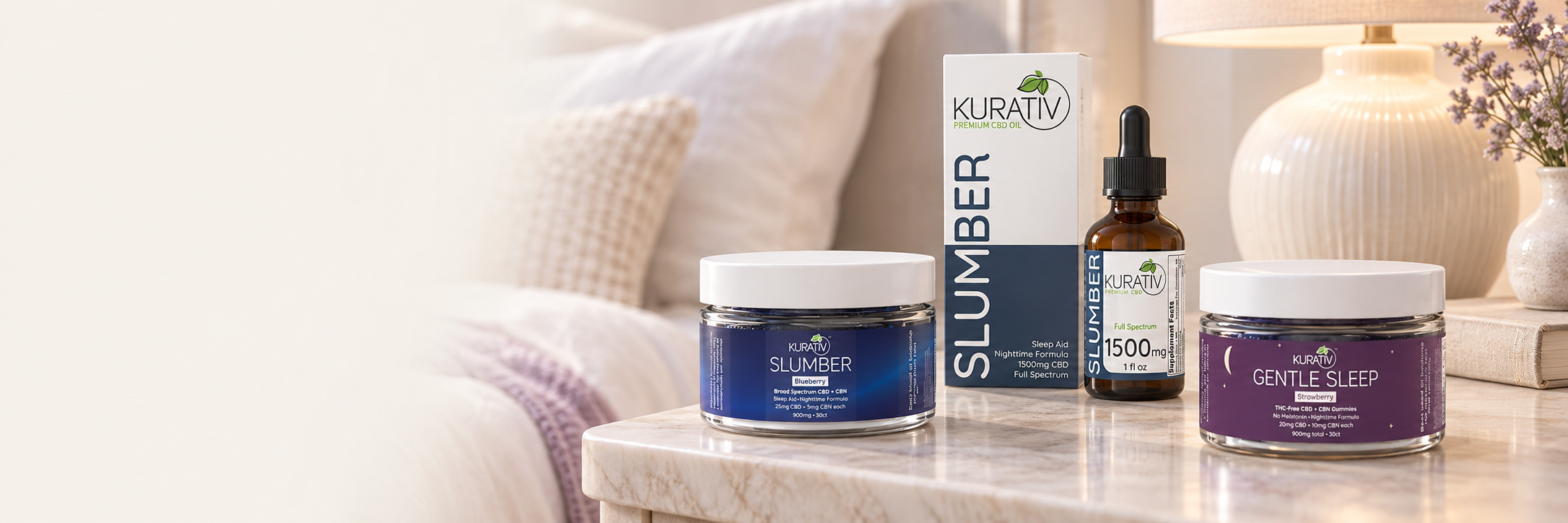 Slumber oil, broad-spectrum Slumber gummies and Gentle Sleep gummies on a softly lit bedside table